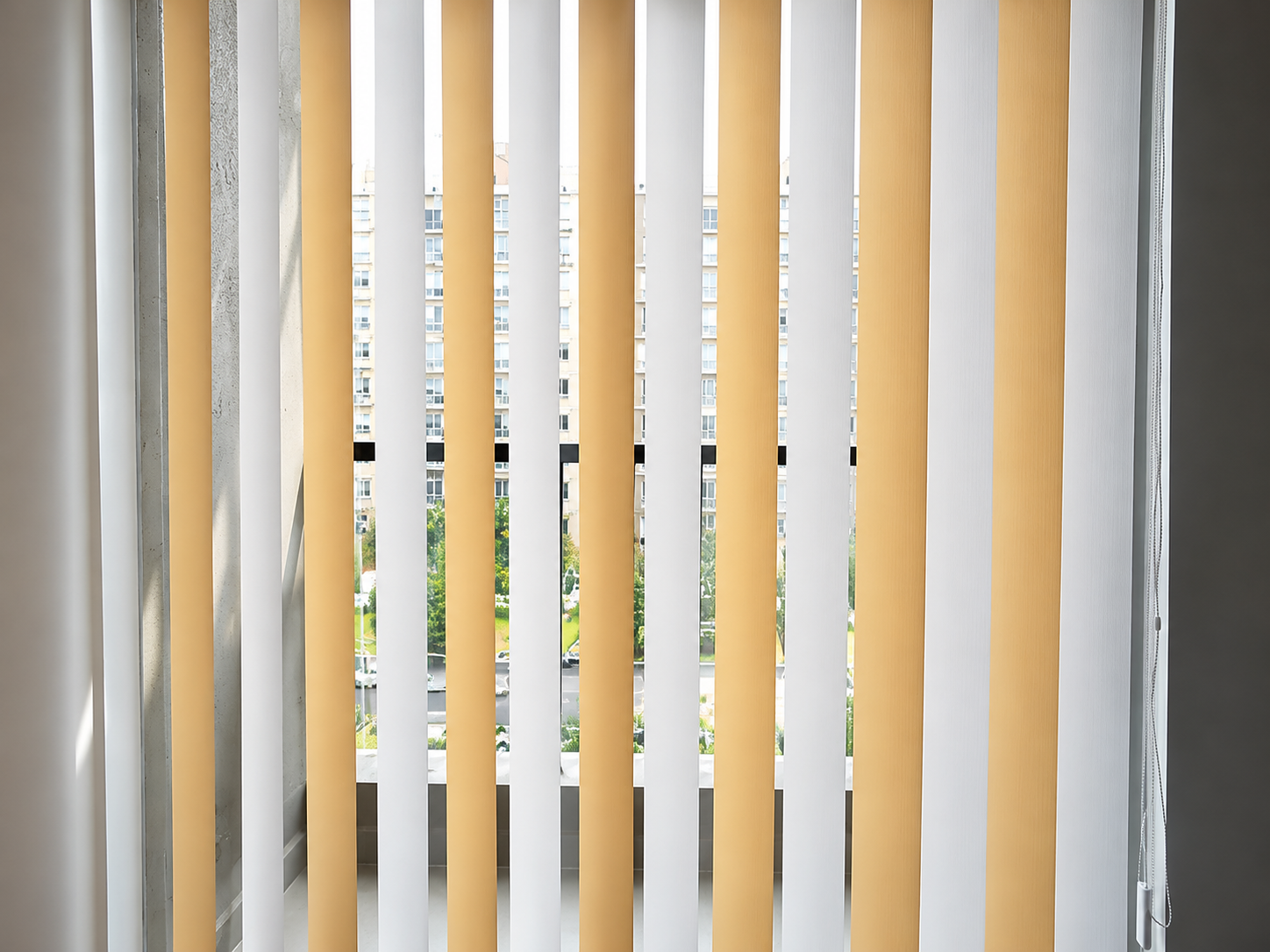 Vertical blinds installed in a bright interior